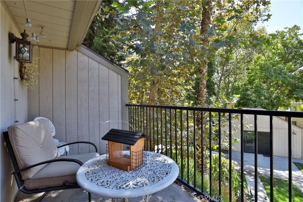 600 Central Avenue, Unit 318 Riverside, CA 92507 - Photo 1 of 1 a outdoor dining space with furniture and outdoor view