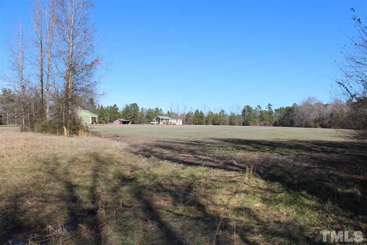 1329 Cole Road Clayton, NC 27520 - Photo 22 of 22 Seller's land wraps around the back and one side of the neighbor.