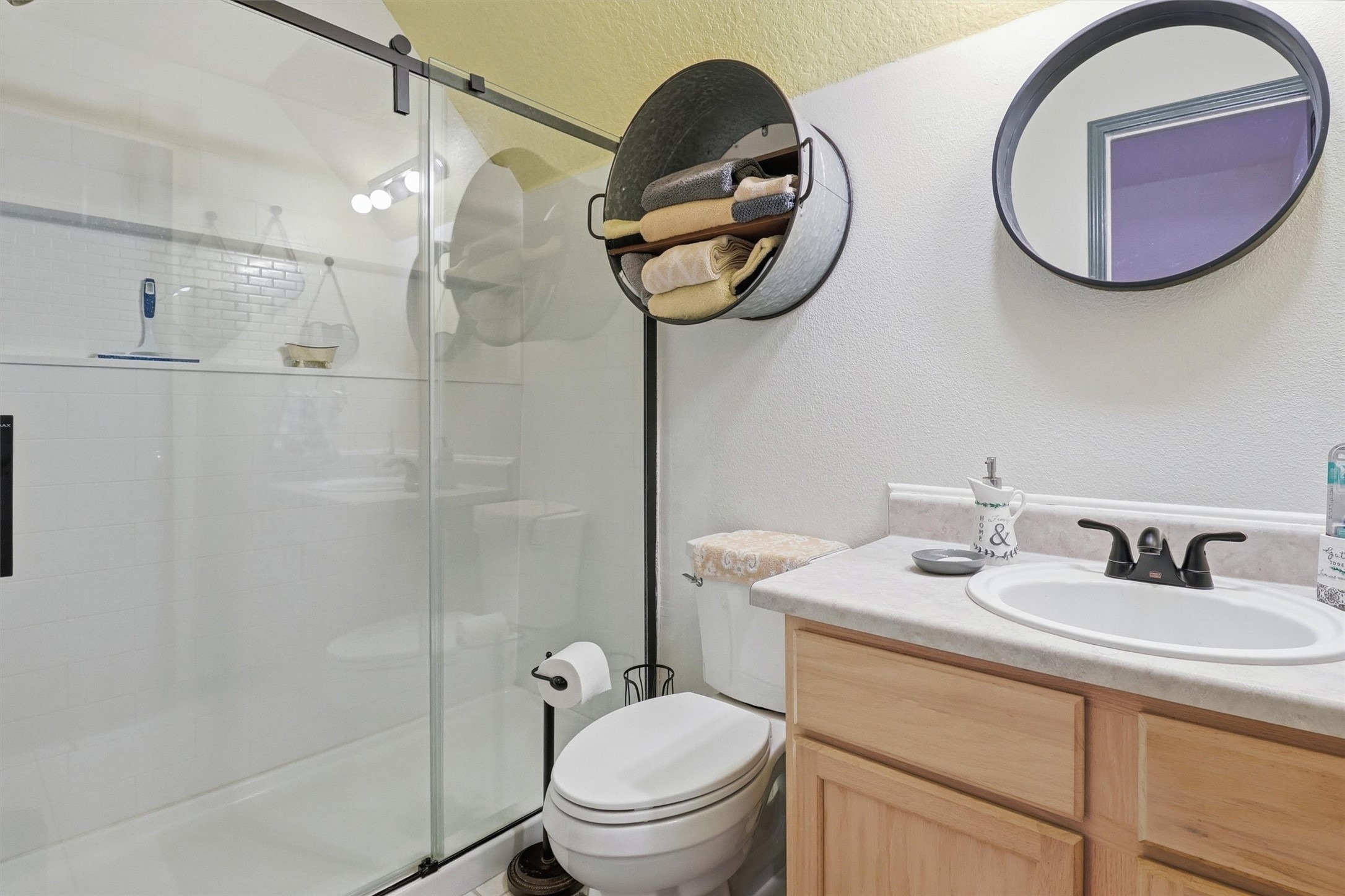 2325 Skrivanek Road Sealy, TX 77474 - Photo 7 of 36 a bathroom with a toilet a sink and mirror