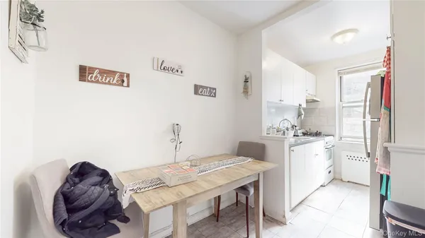 a kitchen with stainless steel appliances kitchen island granite countertop a sink and cabinets
