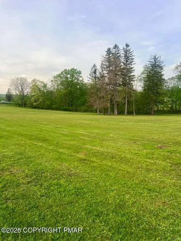 a view of an ocean from a yard