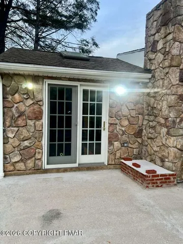 a view of a car garage with a couch