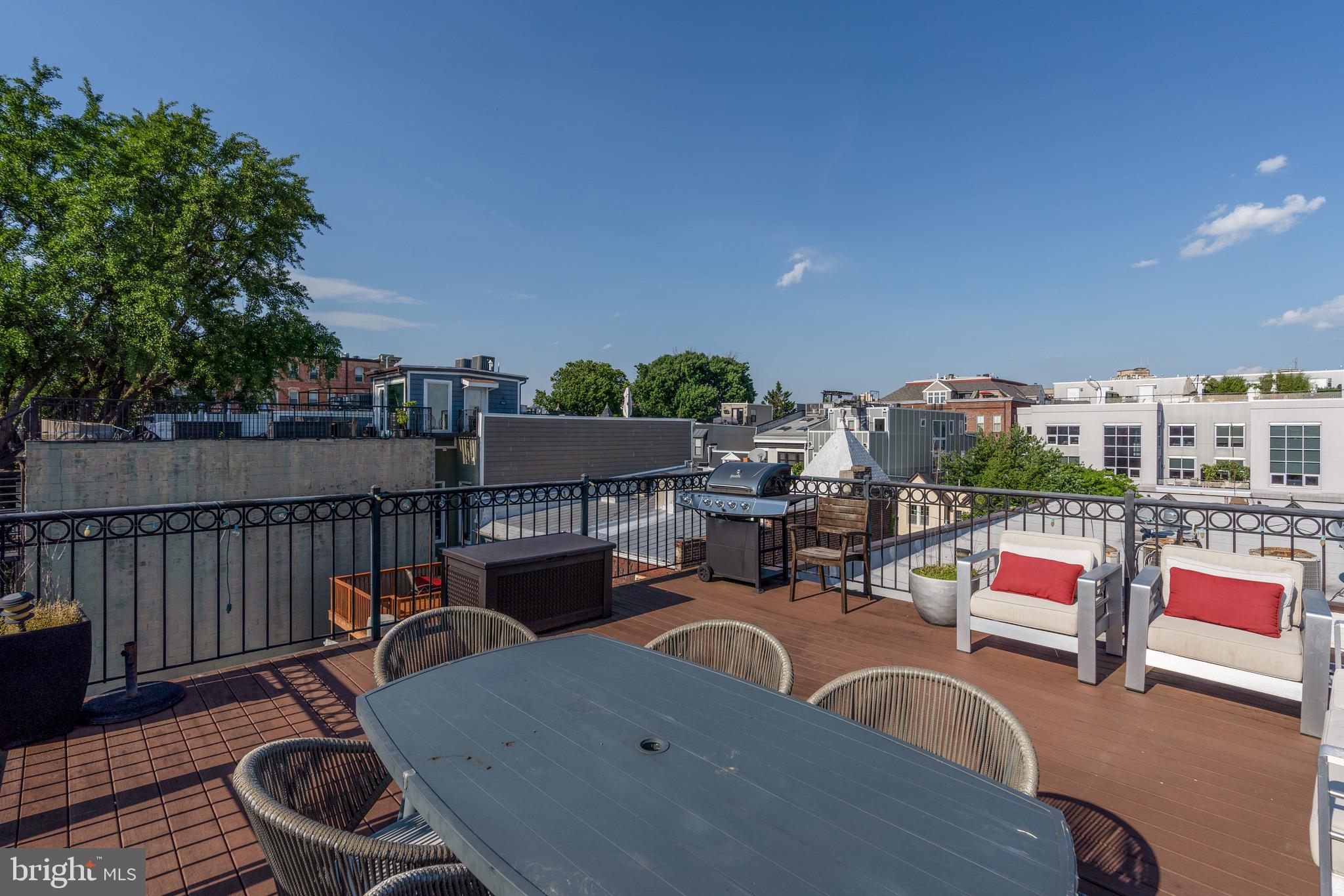 2456 Ontario Road Northwest, Unit 2 Washington, DC 20009 - Photo 30 of 33 Roof deck with grill and seating