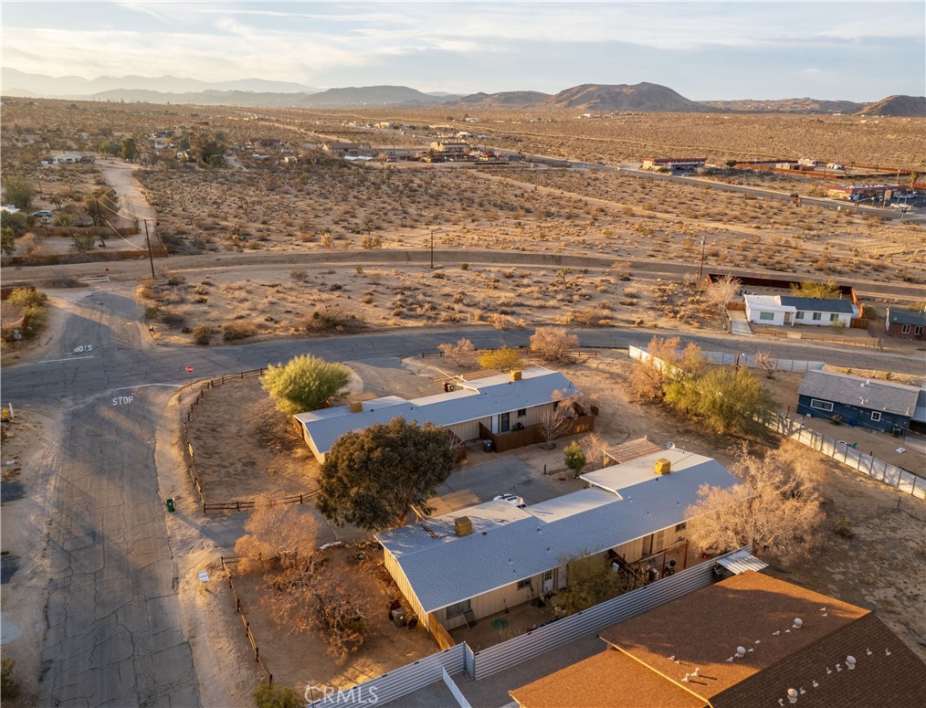 61464 Desert Air Road Joshua Tree, CA 92252 - Photo 11 of 12 an aerial view of residential building with outdoor space