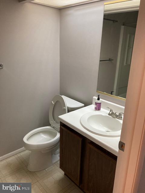 19609 Gunners Branch Road, Unit F Germantown, MD 20876 - Photo 15 of 18 a bathroom with a sink and a toilet