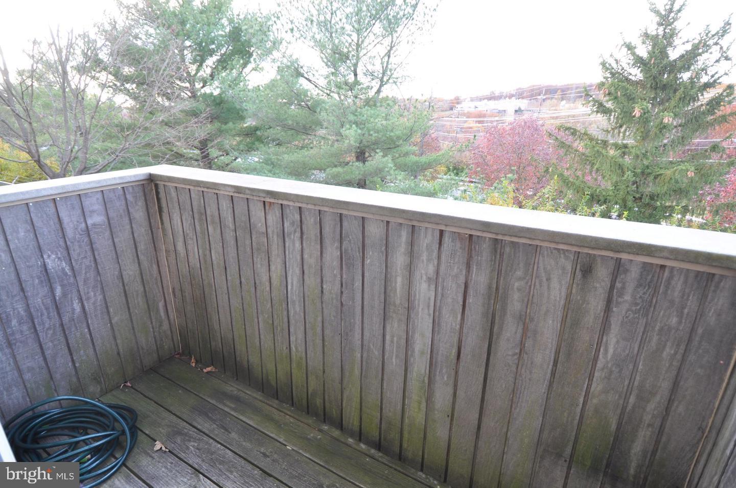 19609 Gunners Branch Road, Unit F Germantown, MD 20876 - Photo 18 of 18 a view of a wooden fence