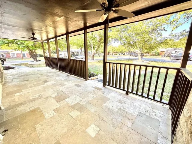 a view of bedroom with a large window