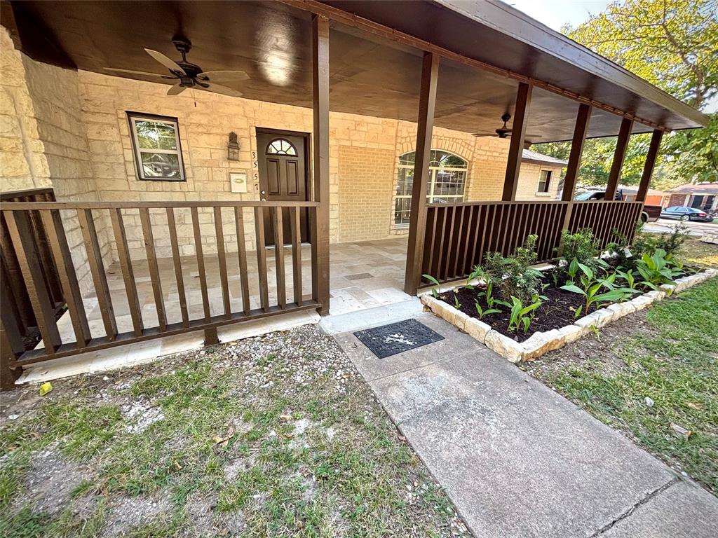 3557 Reeves Street North Richland Hills, TX 76117 - Photo 2 of 34 a view of a porch with wooden floor