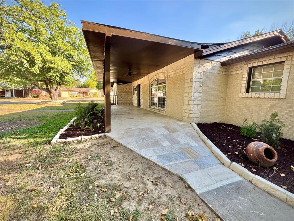 3557 Reeves Street North Richland Hills, TX 76117 - Photo 5 of 34 a backyard of a house with lots of green space