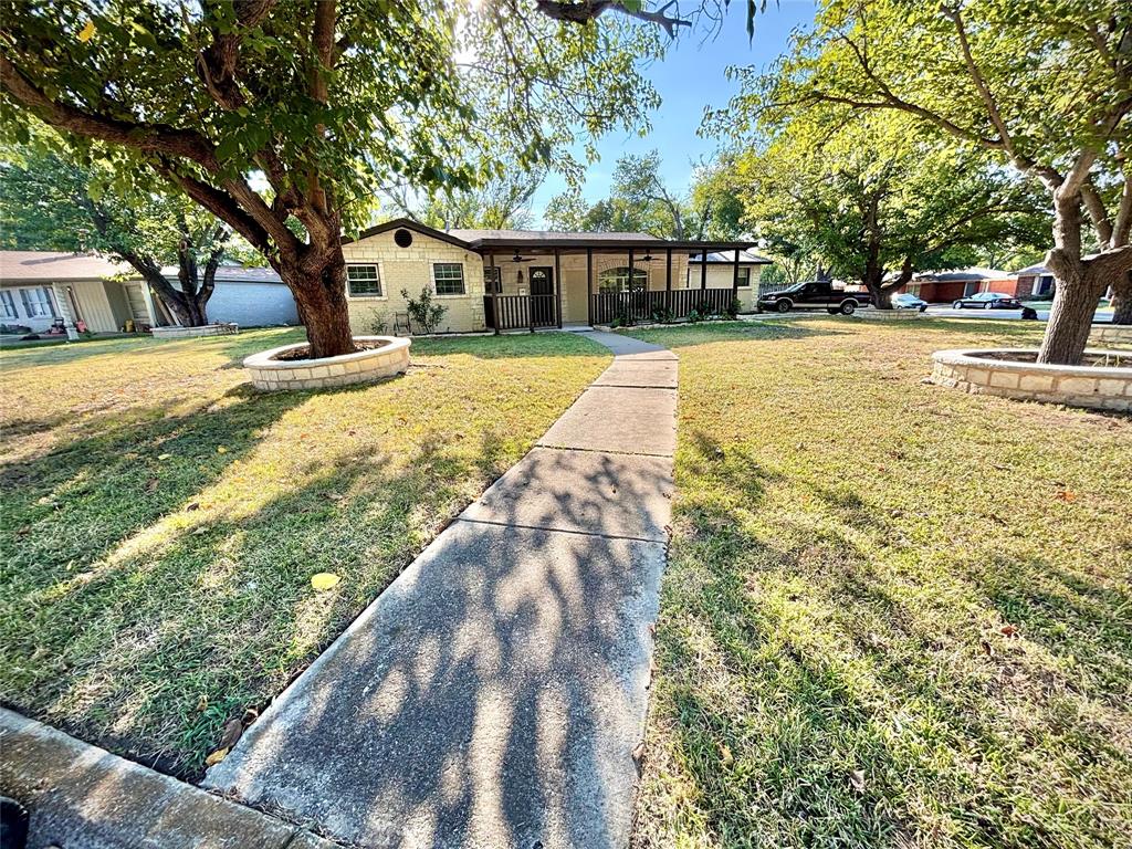 3557 Reeves Street North Richland Hills, TX 76117 - Photo 8 of 34 a view of swimming pool with outdoor seating and yard