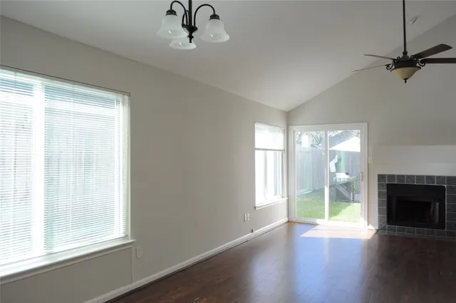 a kitchen with a sink and large window