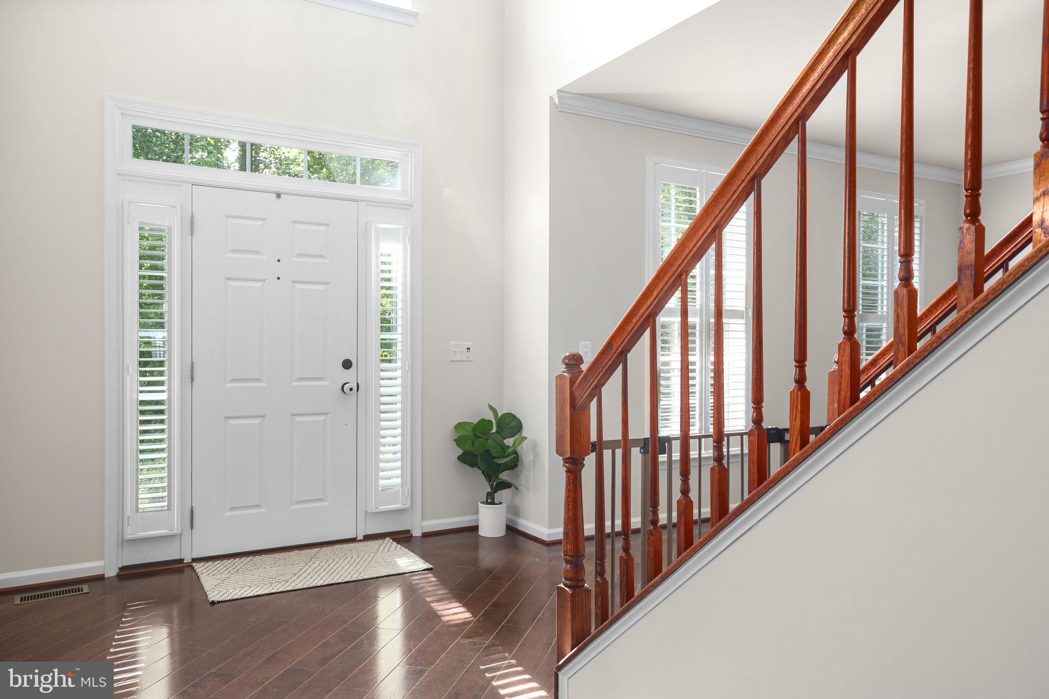 10108 Willow Ridge Lane Spotsylvania, VA 22553 - Photo 16 of 61 a view of an entryway with wooden floor