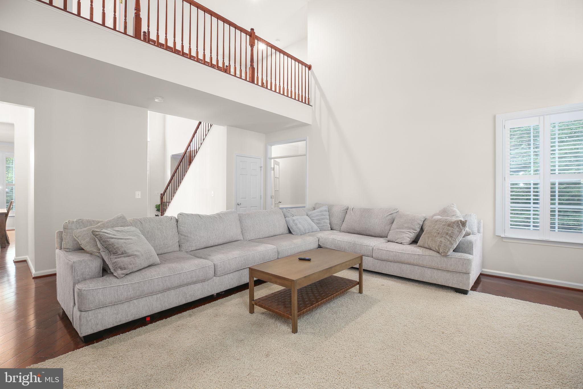 10108 Willow Ridge Lane Spotsylvania, VA 22553 - Photo 28 of 61 a living room with furniture and a large window