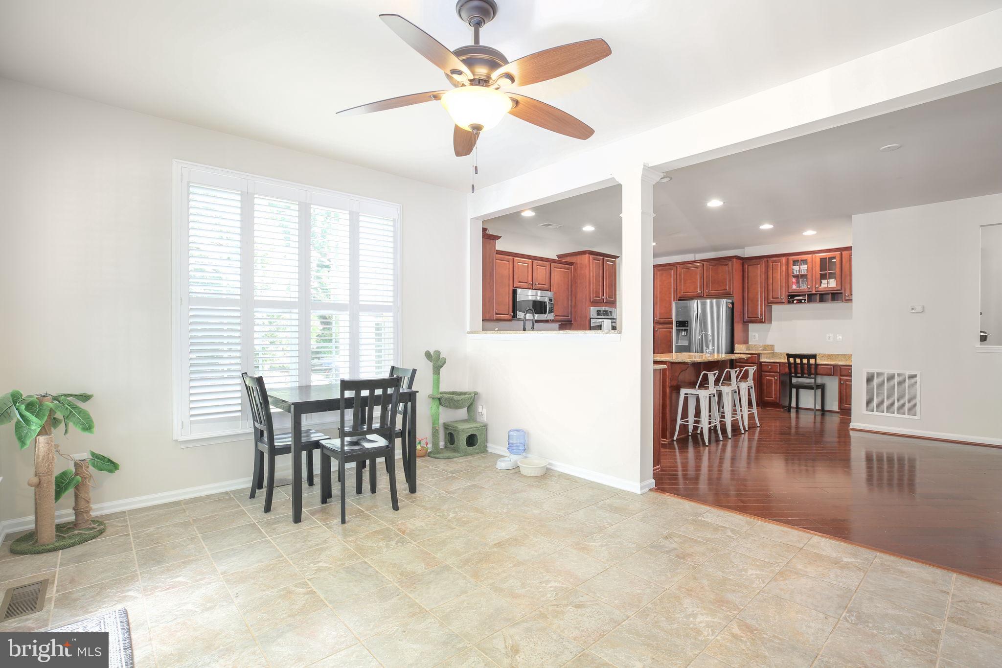 10108 Willow Ridge Lane Spotsylvania, VA 22553 - Photo 29 of 61 a view of a dining room with furniture