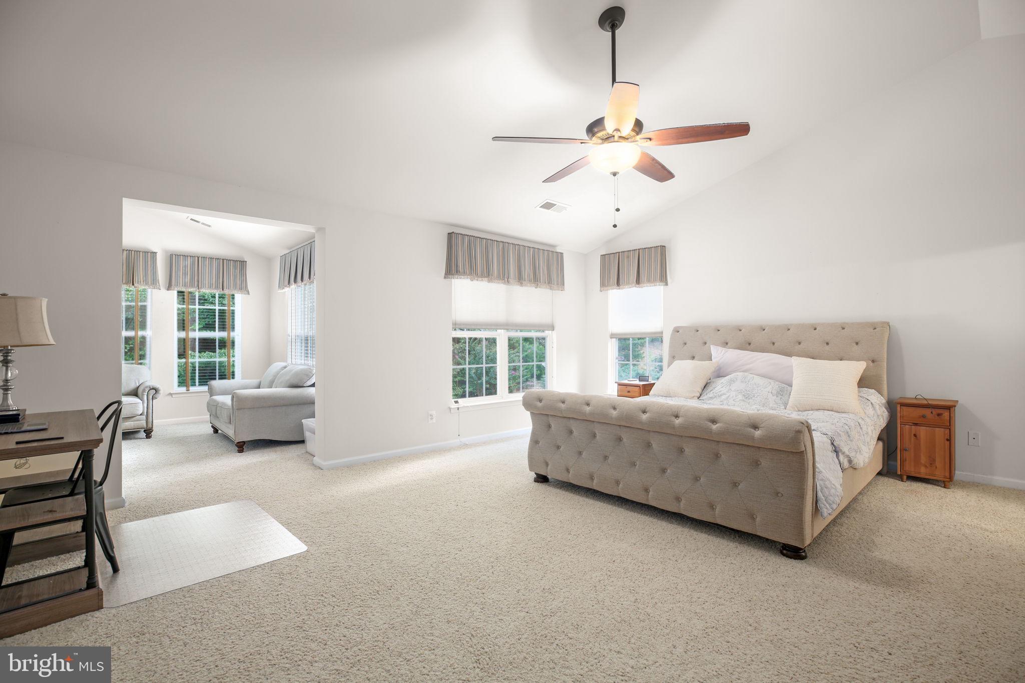 10108 Willow Ridge Lane Spotsylvania, VA 22553 - Photo 43 of 61 a living room with furniture and a chandelier