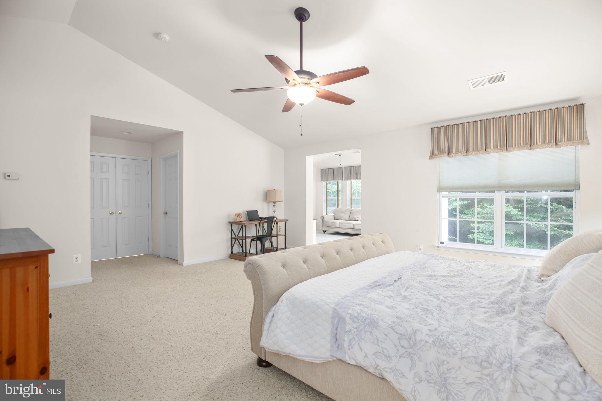 10108 Willow Ridge Lane Spotsylvania, VA 22553 - Photo 45 of 61 a spacious bedroom with a bed and a large window