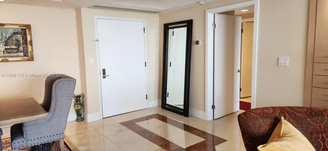 a bedroom with a bed and a mirror