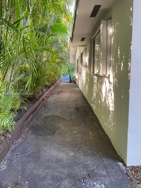 7772 Southwest 106th Terrace Pinecrest, FL 33156 - Photo 22 of 24 a view of a pathway