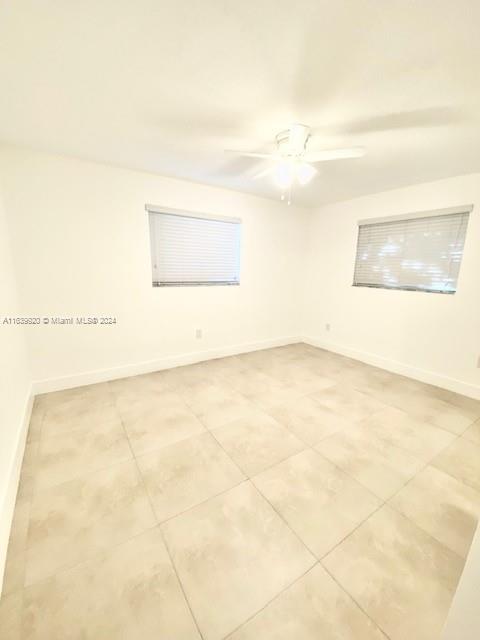 7772 Southwest 106th Terrace Pinecrest, FL 33156 - Photo 10 of 24 a view of an empty room