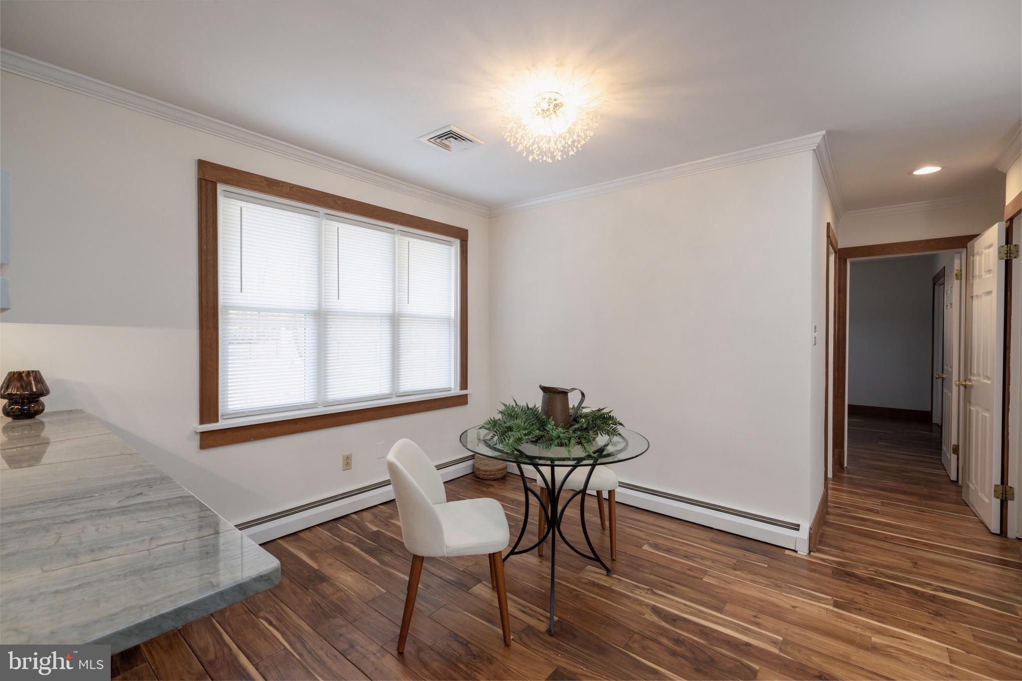 Dining area, looking into hall & 3rd Bdrm