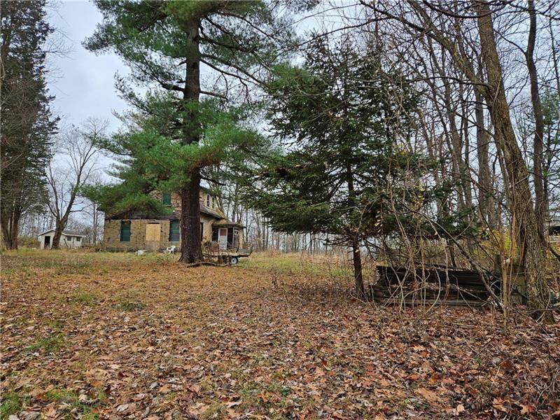 277 Ridge Road Darlington, PA 16115 - Photo 2 of 13 a backyard of a house with lots of green space