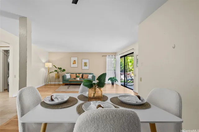 a living room with furniture and a table