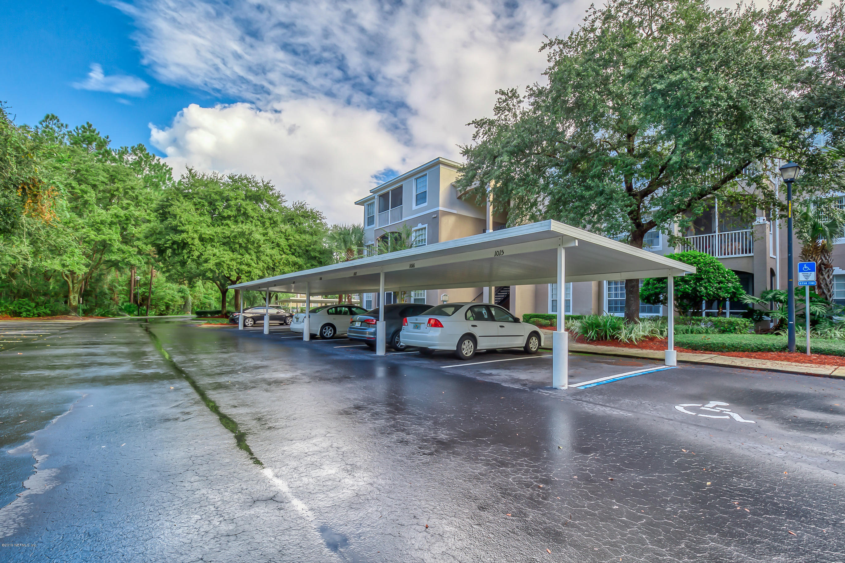 10550 Baymeadows Road, Unit 1023 Jacksonville, FL 32256 - Photo 39 of 42 a view of outdoor space with deck and garden