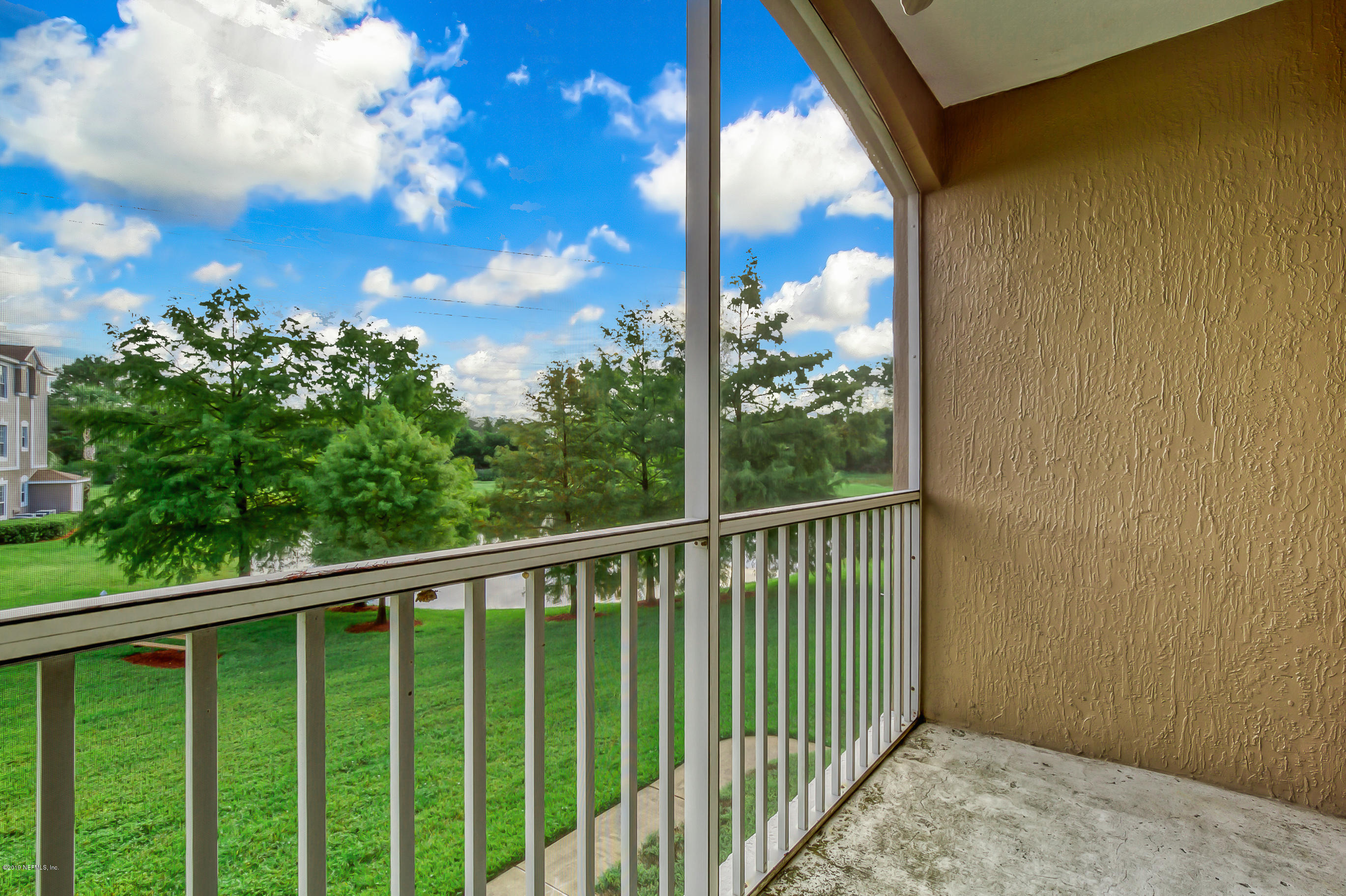 10550 Baymeadows Road, Unit 1023 Jacksonville, FL 32256 - Photo 5 of 42 a view of a balcony with street