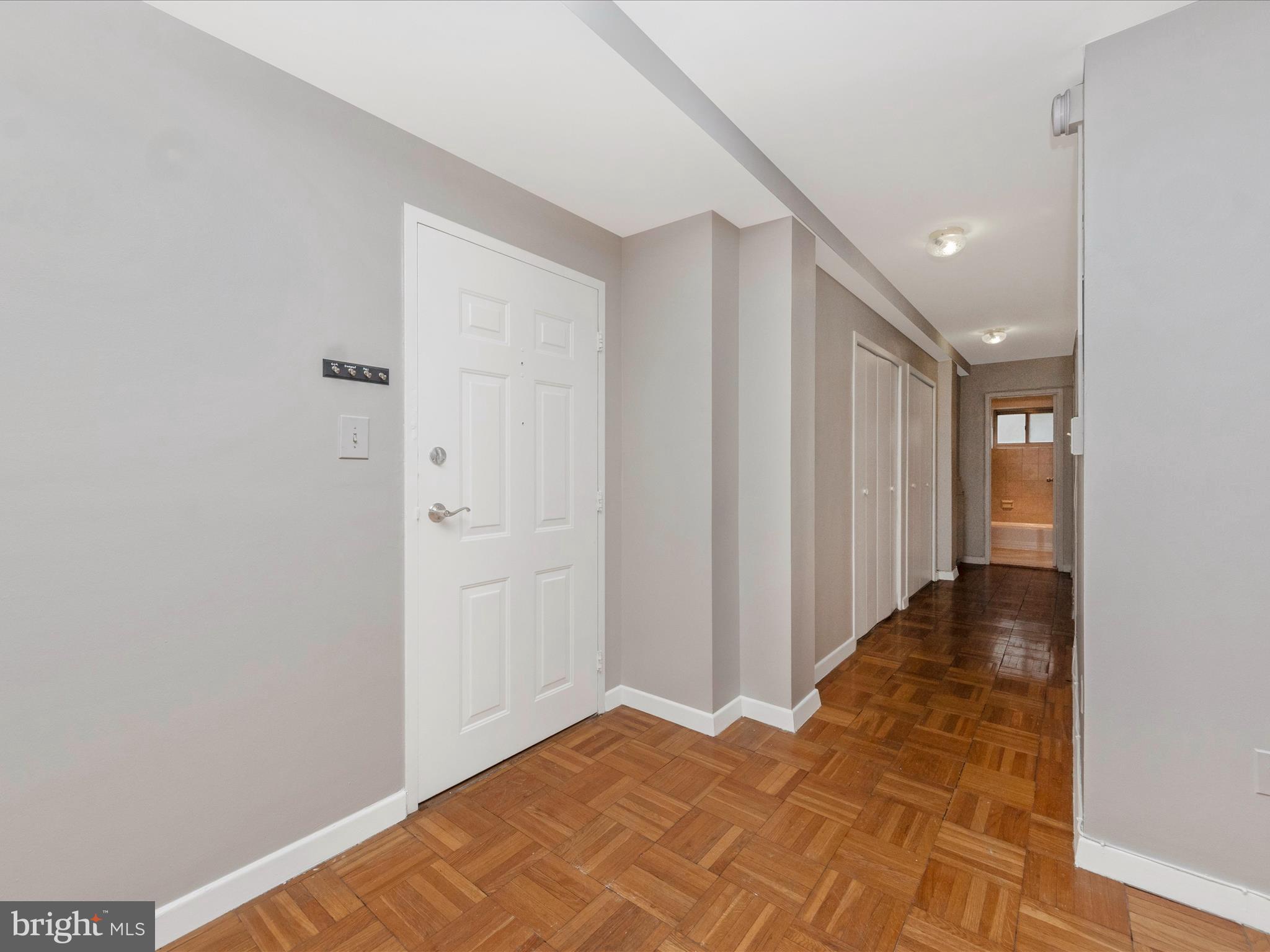 3900 Tunlaw Road Northwest, Unit 104 Washington, DC 20007 - Photo 4 of 36 Front entrance and hallway.
