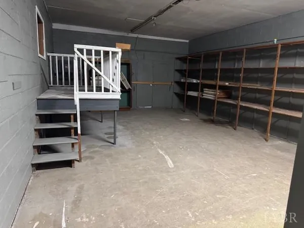 a view of a cars park in front of house