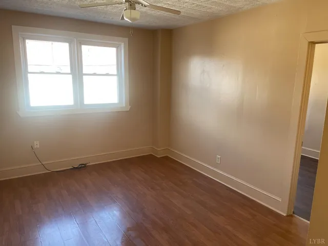 a kitchen with a refrigerator and a sink