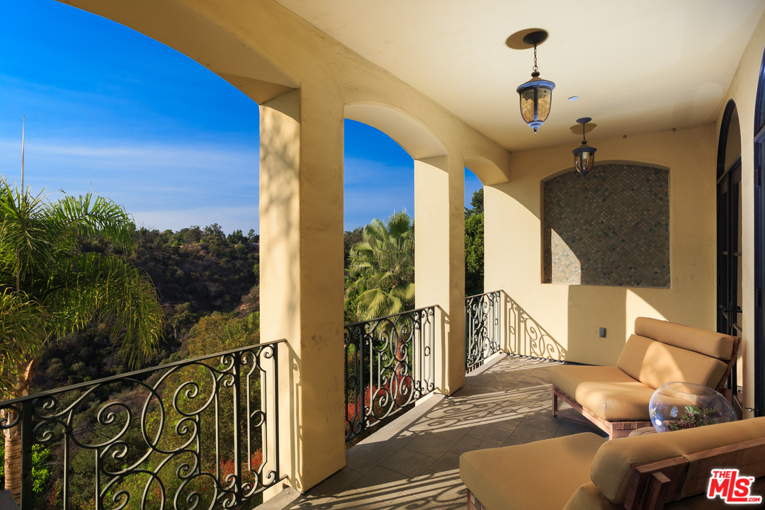 3110 Benedict Canyon Drive Beverly Hills, CA 90210 - Photo 10 of 45 a view of balcony with furniture