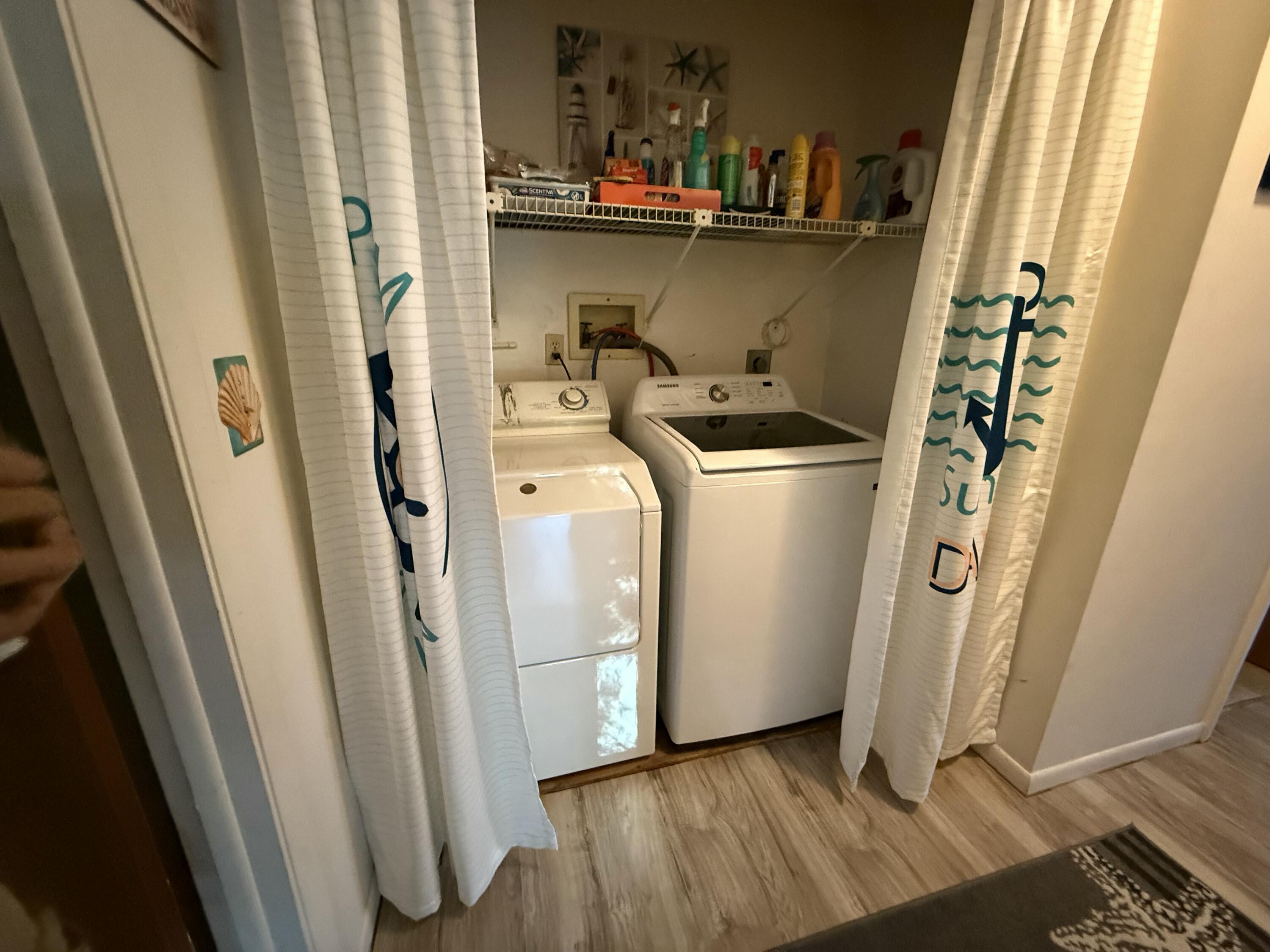 760 Musa Drive Key Largo, FL 33037 - Photo 15 of 20 a view of a storage and utility room with washer and dryer