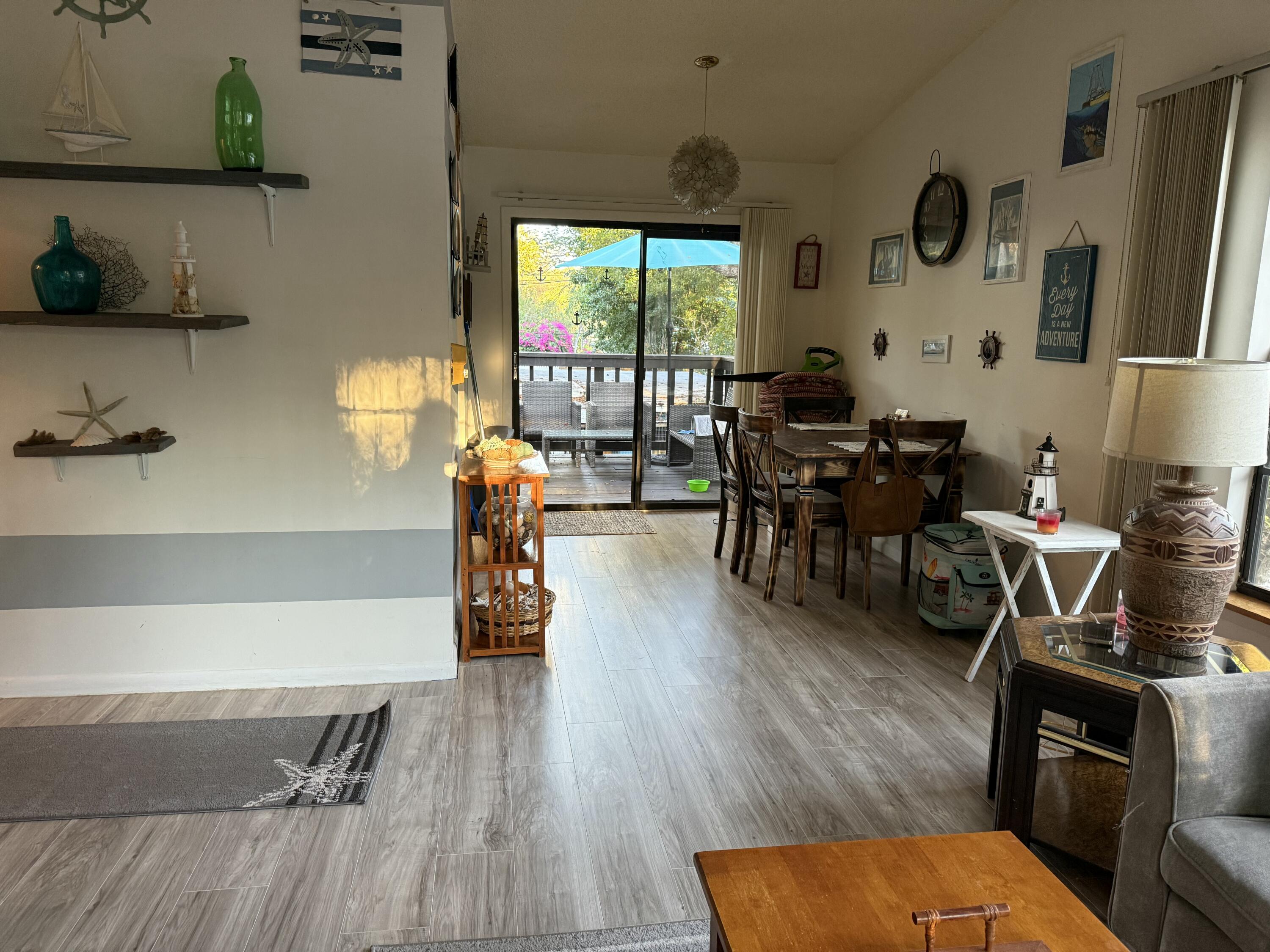 760 Musa Drive Key Largo, FL 33037 - Photo 18 of 20 a living room with furniture and wooden floor