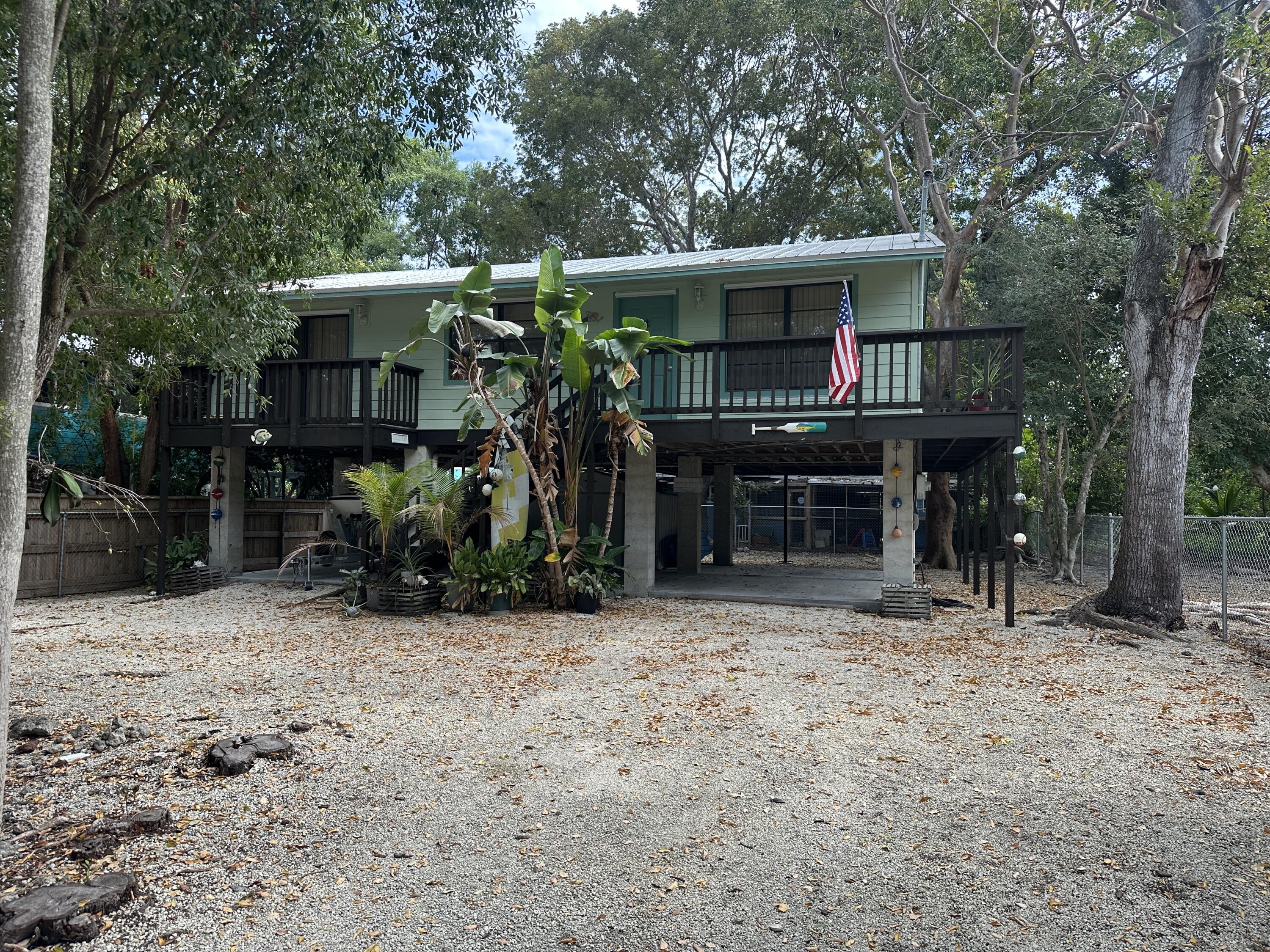 760 Musa Drive Key Largo, FL 33037 - Photo 3 of 20 a view of house with a outdoor space