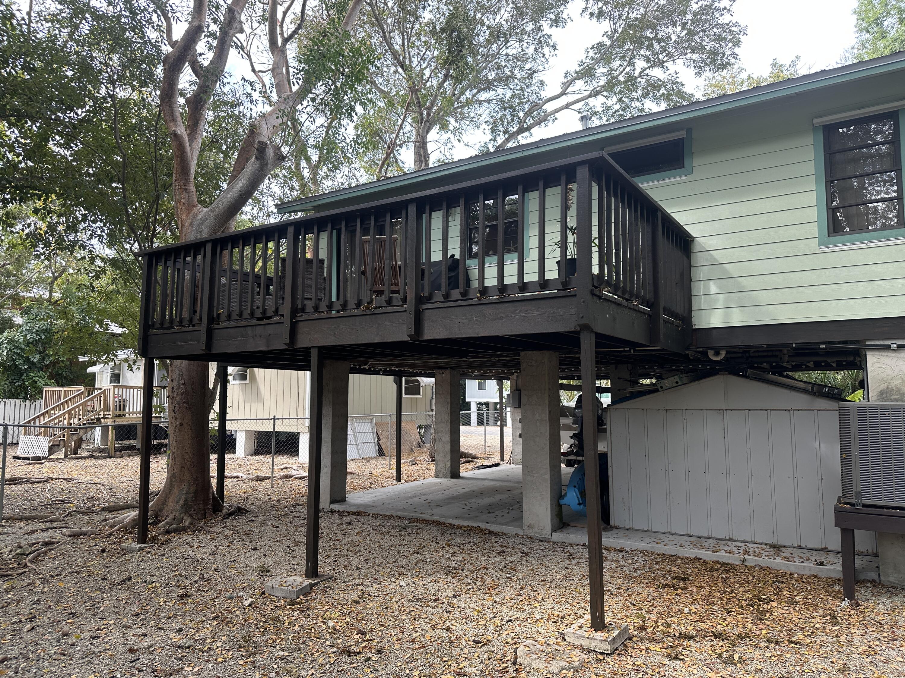 760 Musa Drive Key Largo, FL 33037 - Photo 5 of 20 a front view of a house