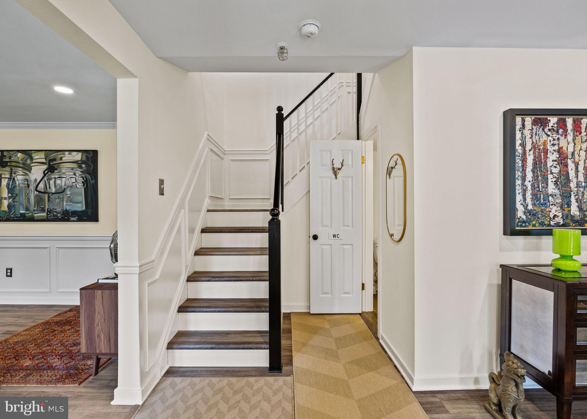 104 Woodside Road, Unit B106 Haverford, PA 19041 - Photo 14 of 31 a view of entryway with wooden floor and staircase