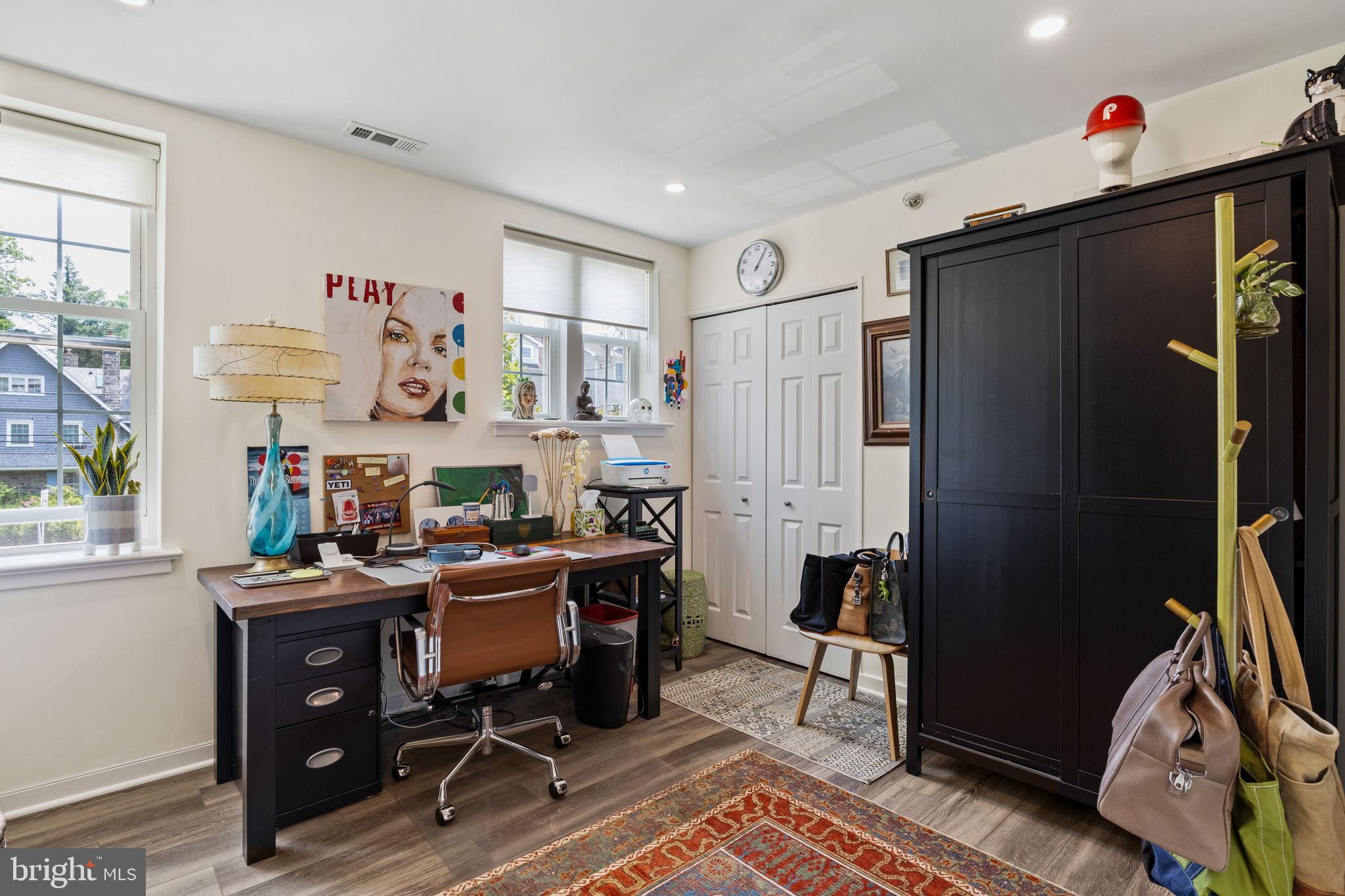 104 Woodside Road, Unit B106 Haverford, PA 19041 - Photo 16 of 31 a view of a workspace with furniture and a window