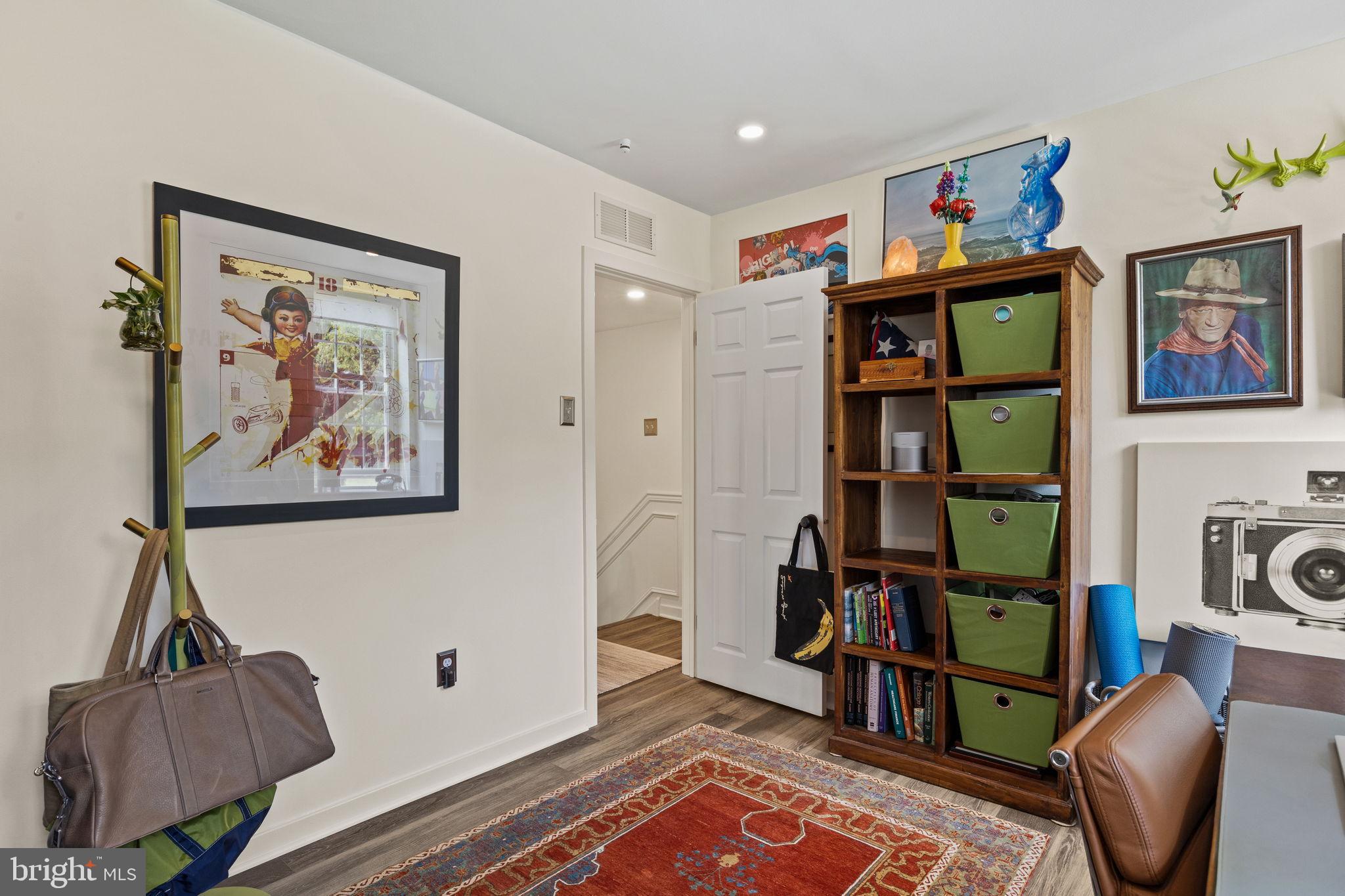 104 Woodside Road, Unit B106 Haverford, PA 19041 - Photo 17 of 31 a view of a workspace with furniture and toys