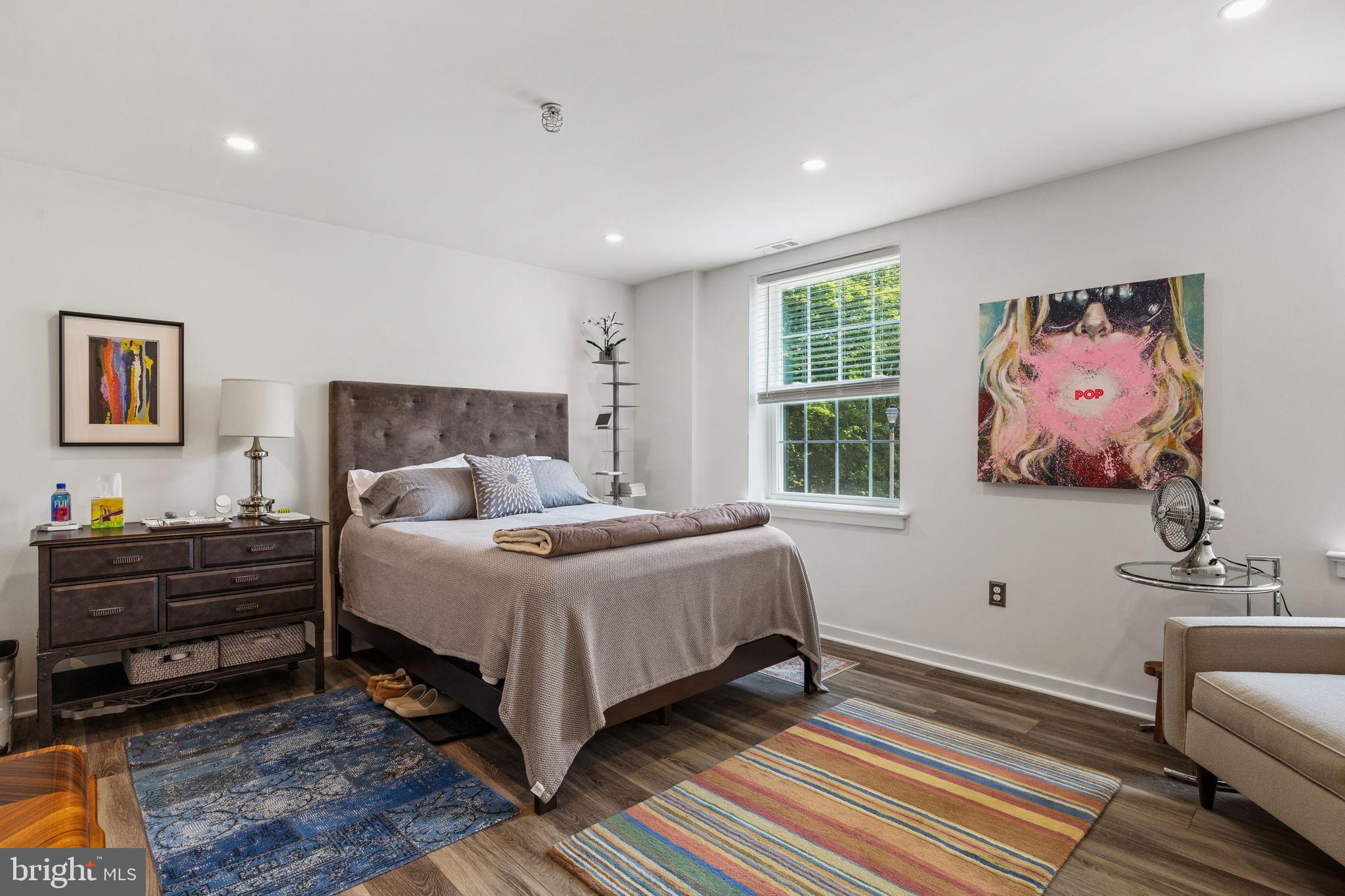 104 Woodside Road, Unit B106 Haverford, PA 19041 - Photo 18 of 31 a bedroom with a bed and a window