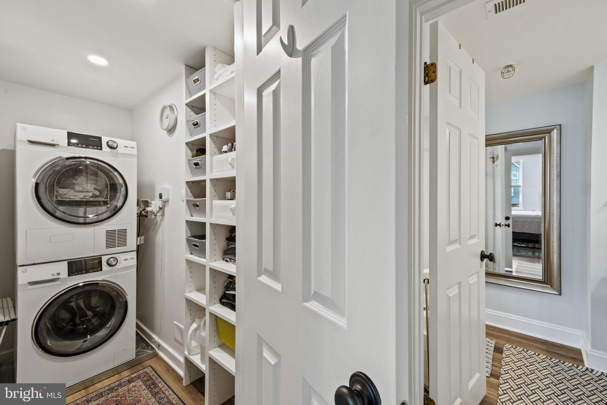 104 Woodside Road, Unit B106 Haverford, PA 19041 - Photo 21 of 31 a view of a bedroom with washer and dryer