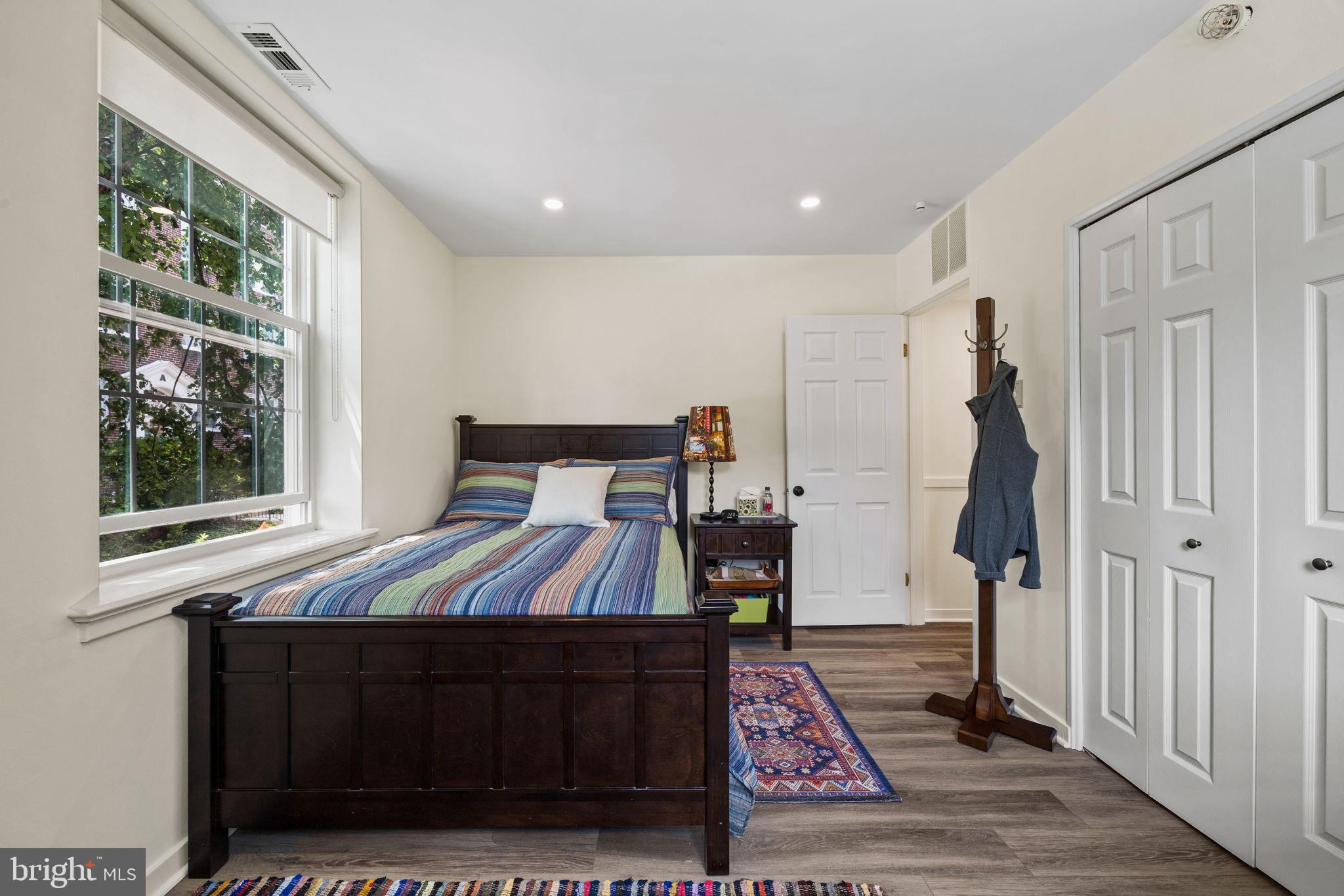 104 Woodside Road, Unit B106 Haverford, PA 19041 - Photo 26 of 31 a bedroom with a bed and a window