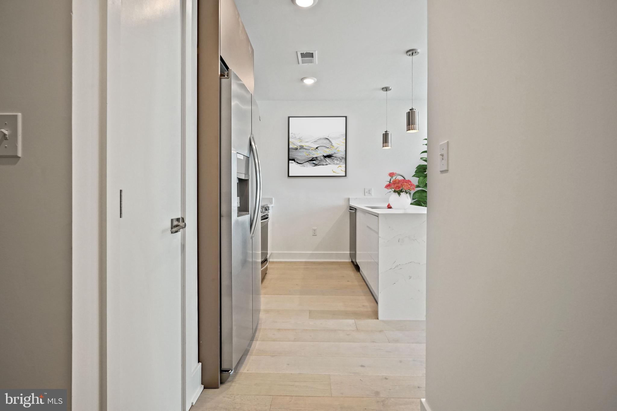 2027 Rhode Island Avenue Northeast, Unit 401 Washington, DC 20018 - Photo 14 of 29 a view of an entryway with wooden floor