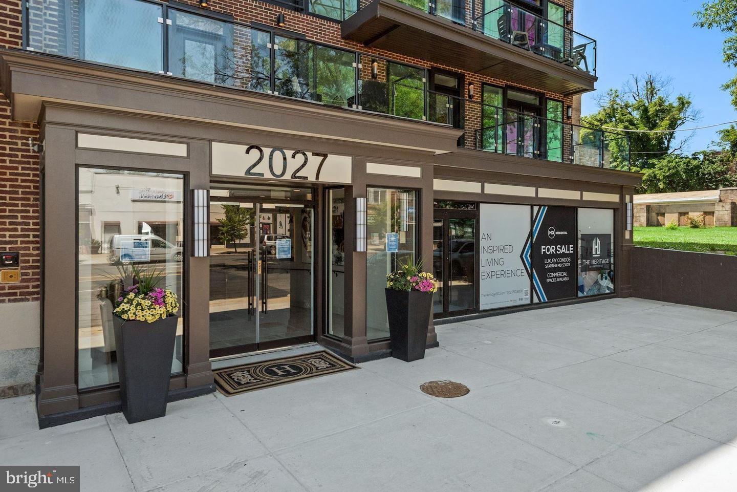 2027 Rhode Island Avenue Northeast, Unit 401 Washington, DC 20018 - Photo 25 of 29 a view of a building with a outdoor space