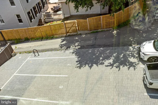 a picture of a bathroom with a white wall and a white wall