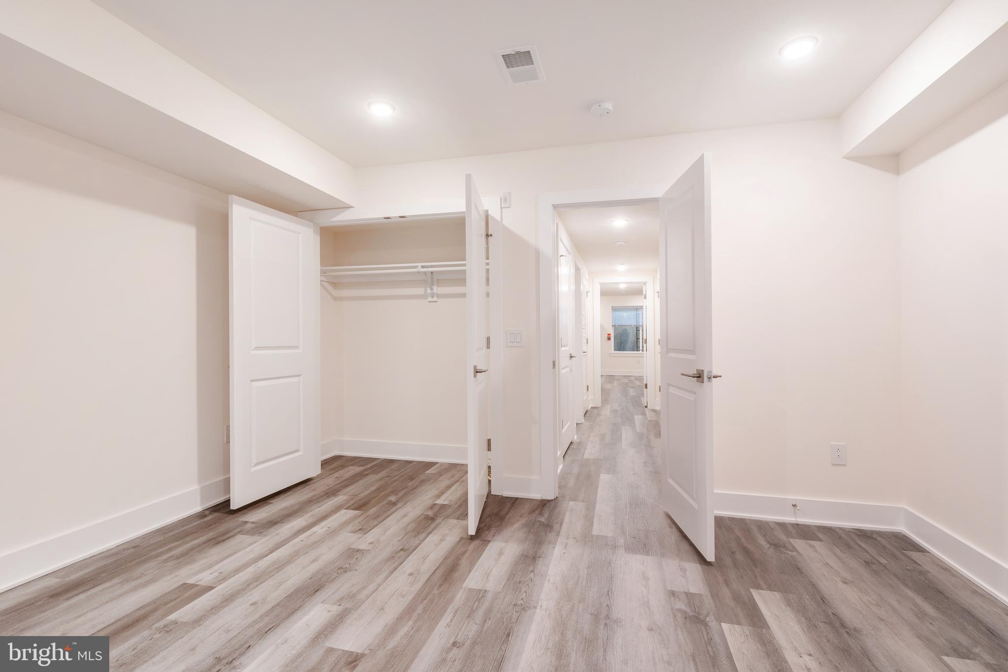 2612 Braddock Street, Unit 1 Philadelphia, PA 19125 - Photo 14 of 17 wooden floor in an empty room