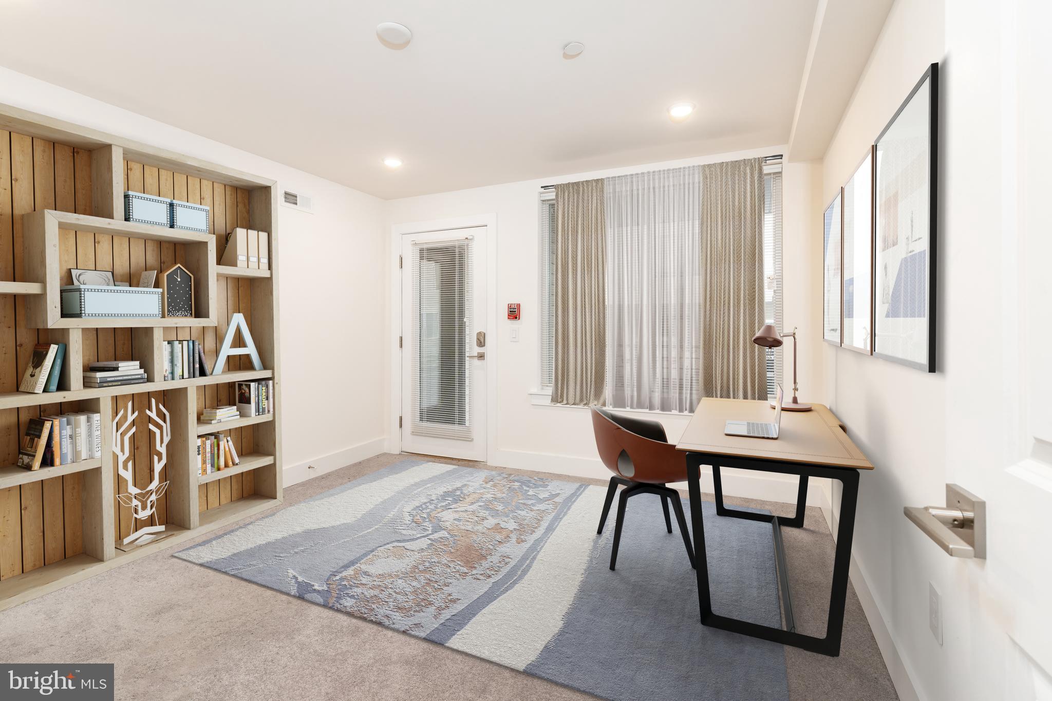 2612 Braddock Street, Unit 1 Philadelphia, PA 19125 - Photo 6 of 17 a view of a livingroom with furniture and window