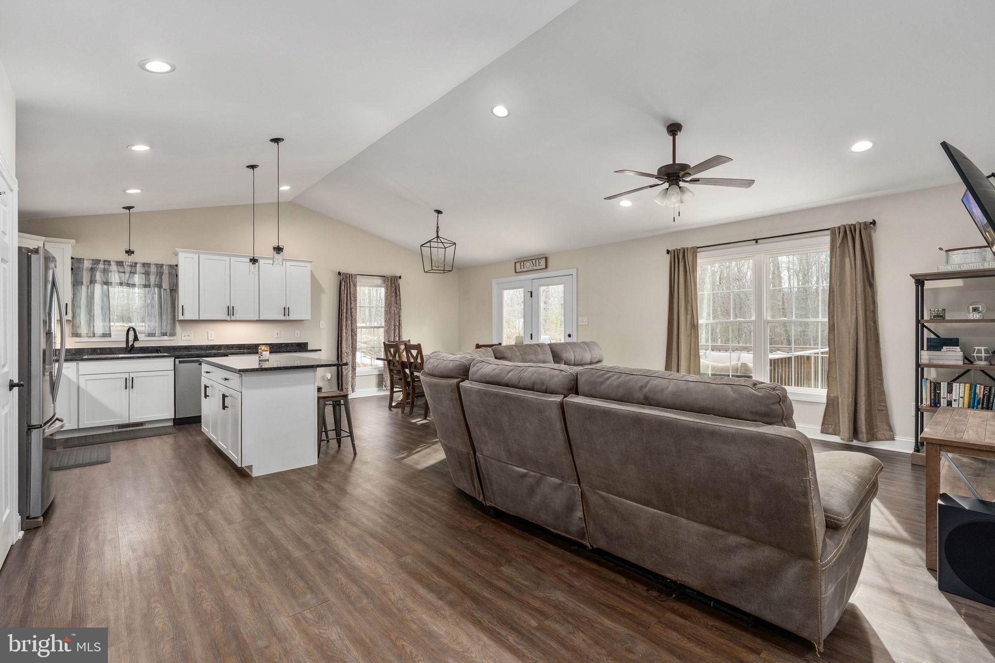 10514 Hart Court Culpeper, VA 22701 - Photo 10 of 34 a living room with furniture and kitchen view