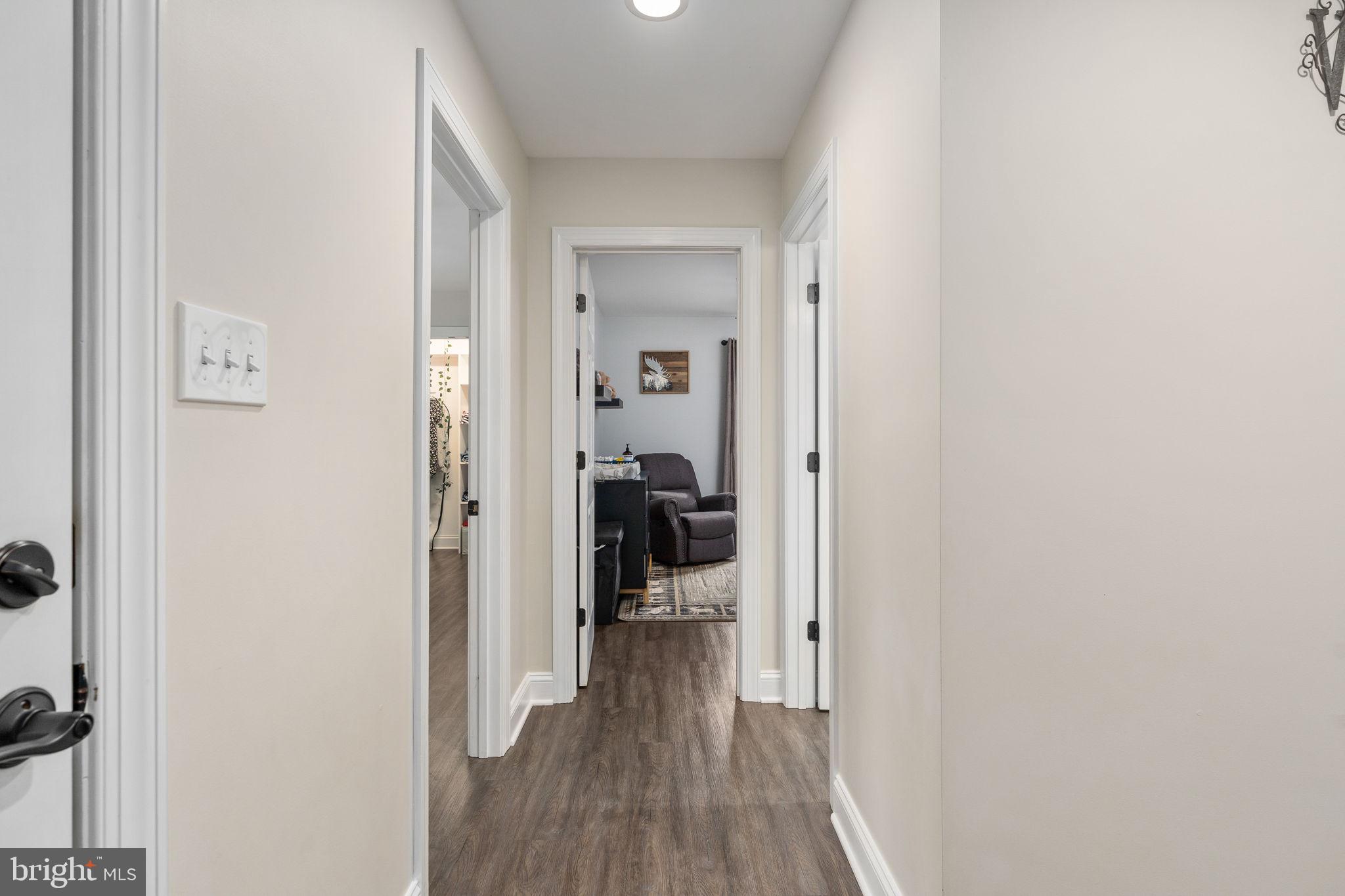 10514 Hart Court Culpeper, VA 22701 - Photo 20 of 34 a view of a bedroom from a hallway