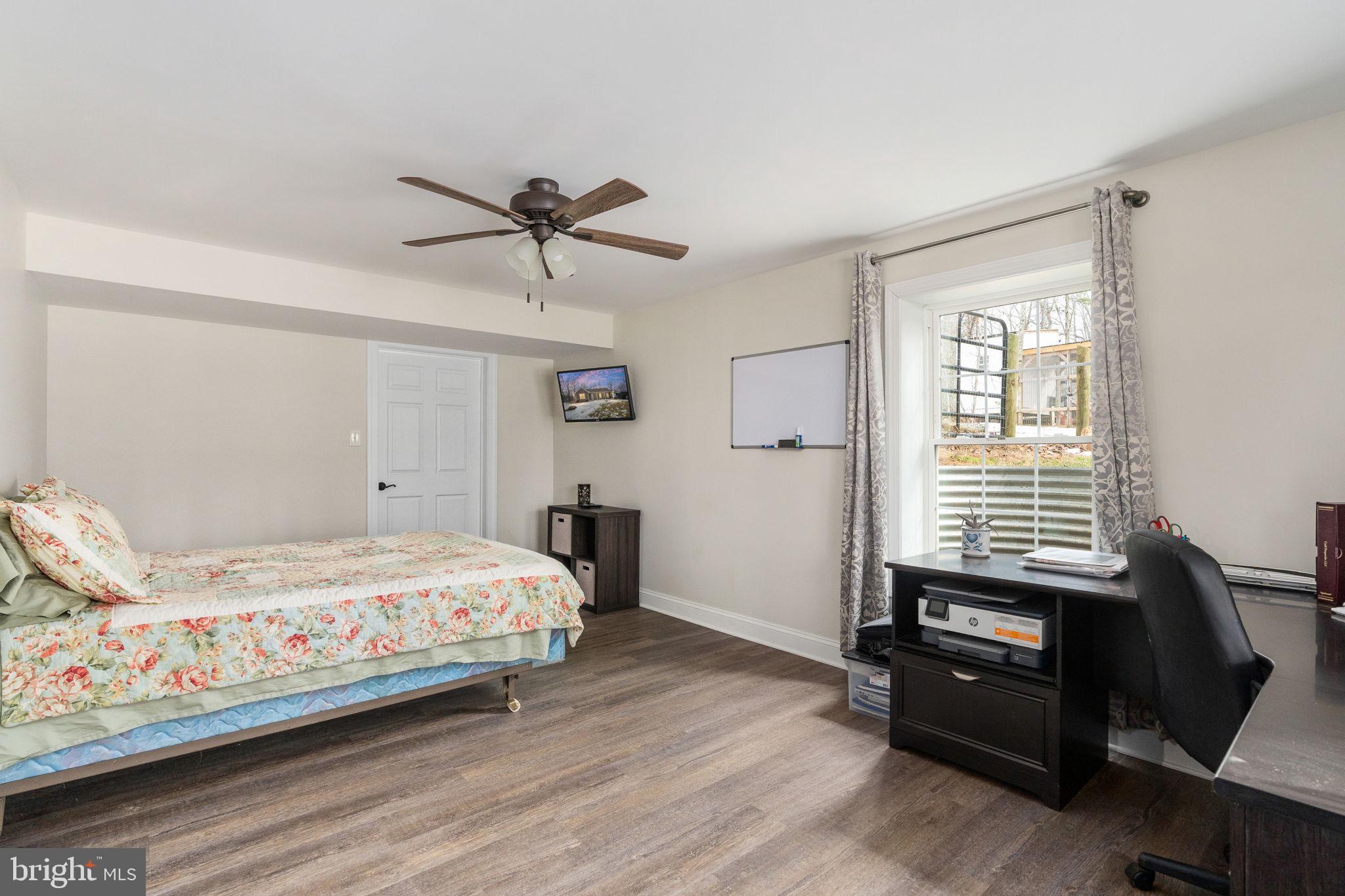 10514 Hart Court Culpeper, VA 22701 - Photo 31 of 34 a bedroom with a bed and a window